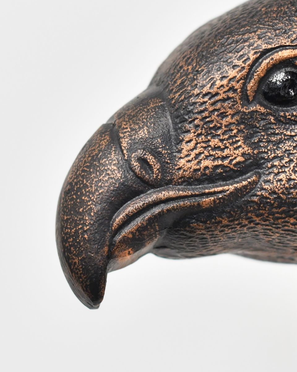 Close up of intricate beak detail on copper eagle wall bust