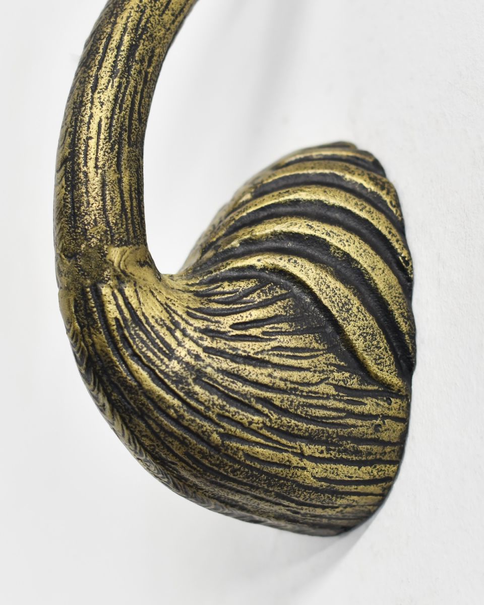 Close up of body detail on gold animal wall bust