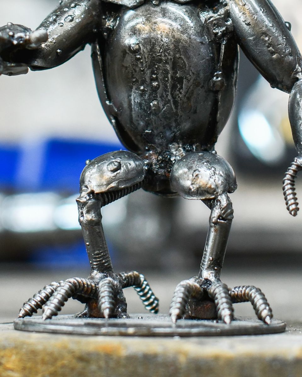 Close up of body detail on scrap metal home art sculpture