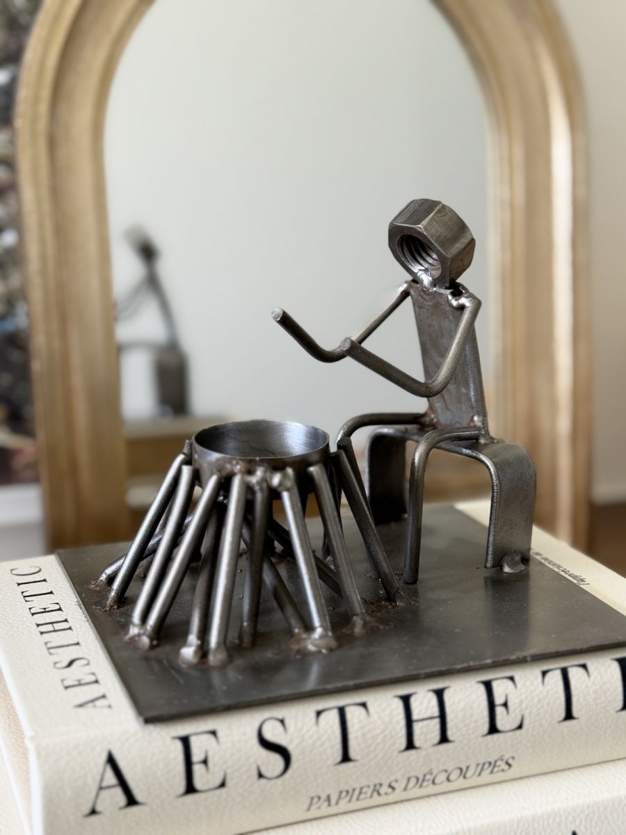 Close up of recycled metal tealight holder