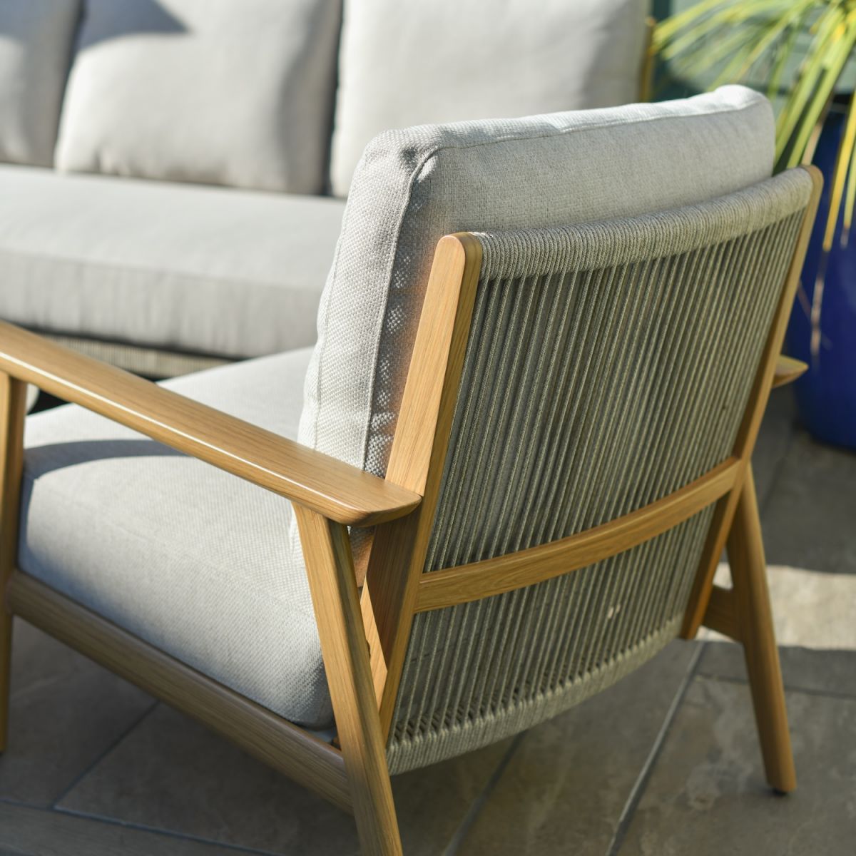 Close up of intricate rope weave detail on five seater outdoor furniture set