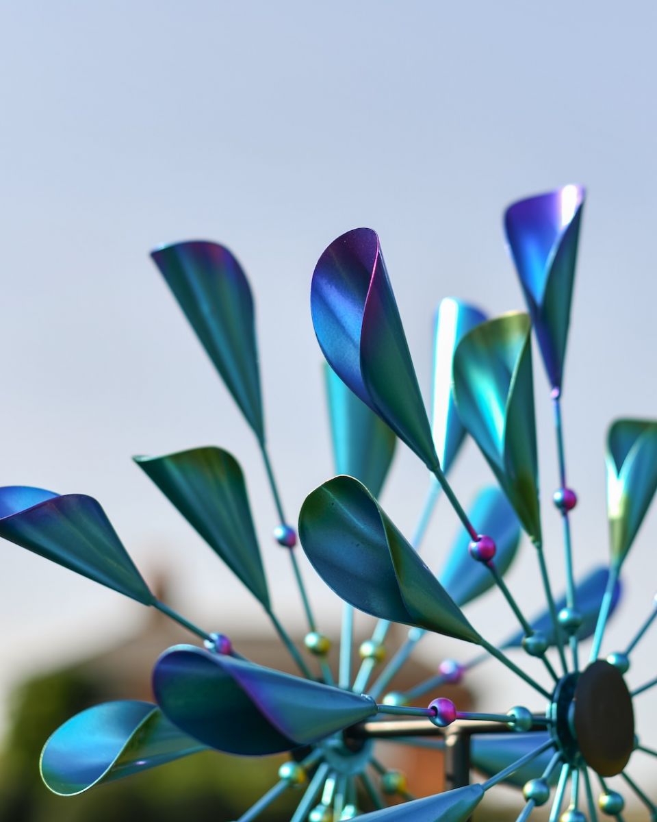 Close up of colourful petal edge detail on iridescent windspinner