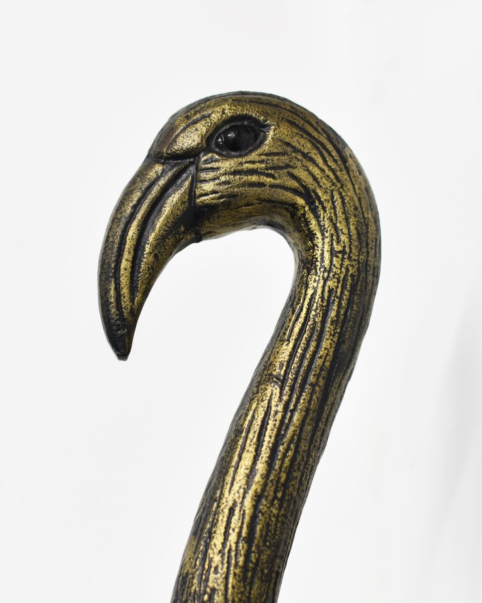 Close up of intricate face detail on flamingo wall bust