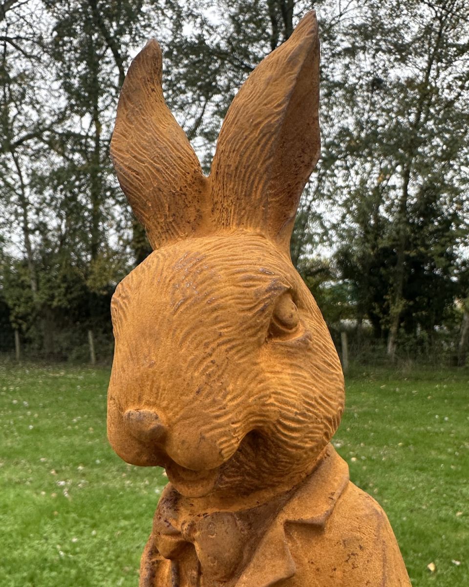 Close up of intricate detail on rabbits garden sculpture