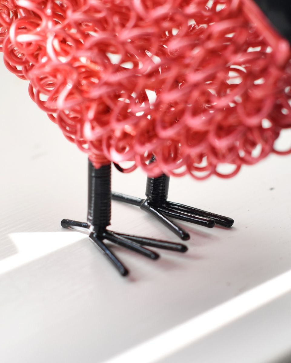 Close up of feet detail on recycled cockerel sculpture