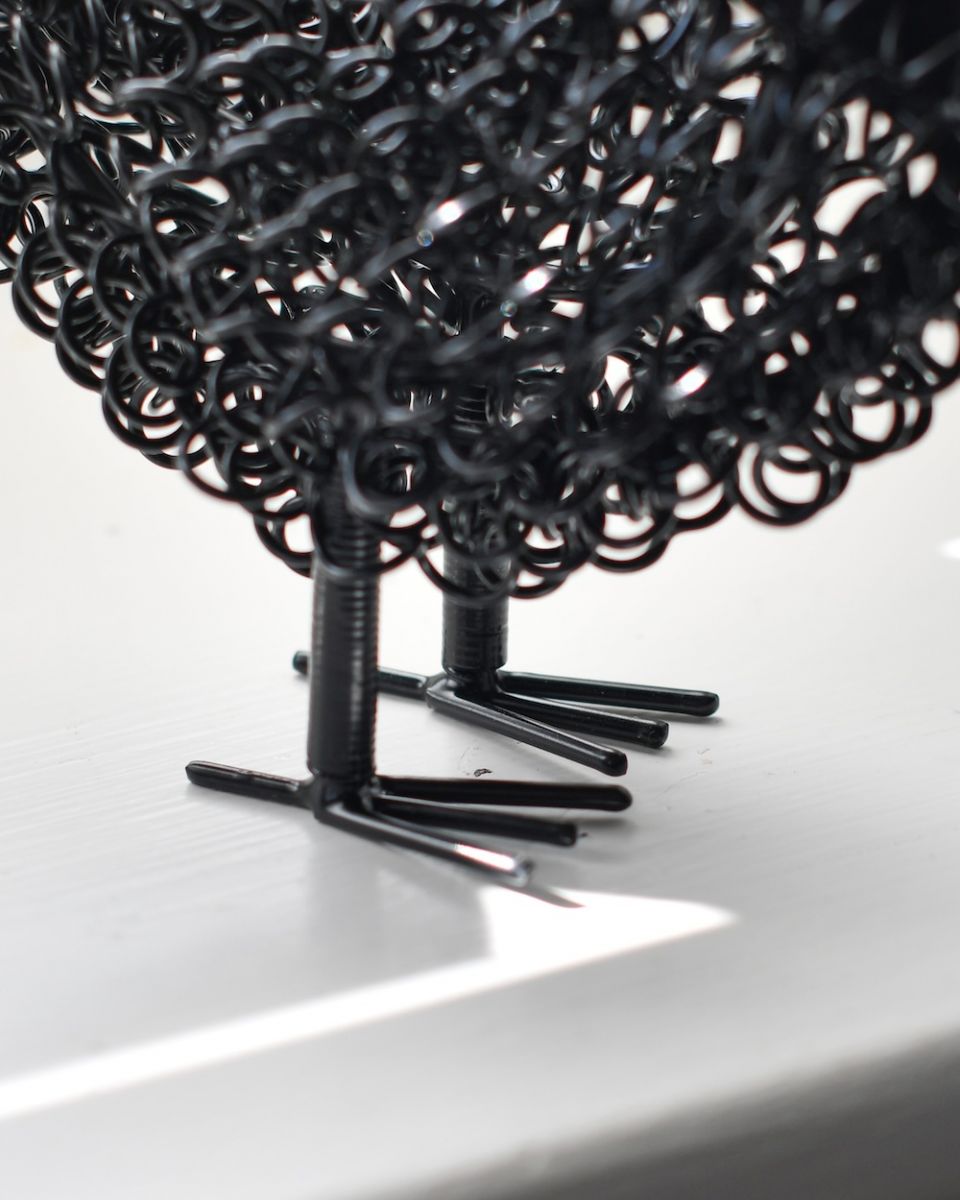 Close up of feet detail on recycled cockerel sculpture Close up of feet detail on recycled cockerel sculpture