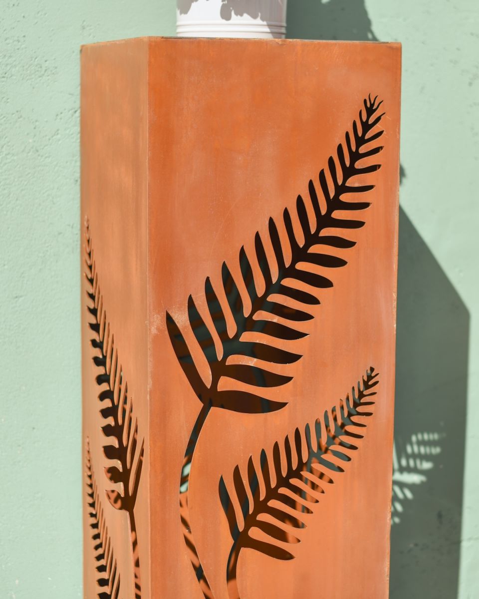 Close up of intricate detail on rustic garden column