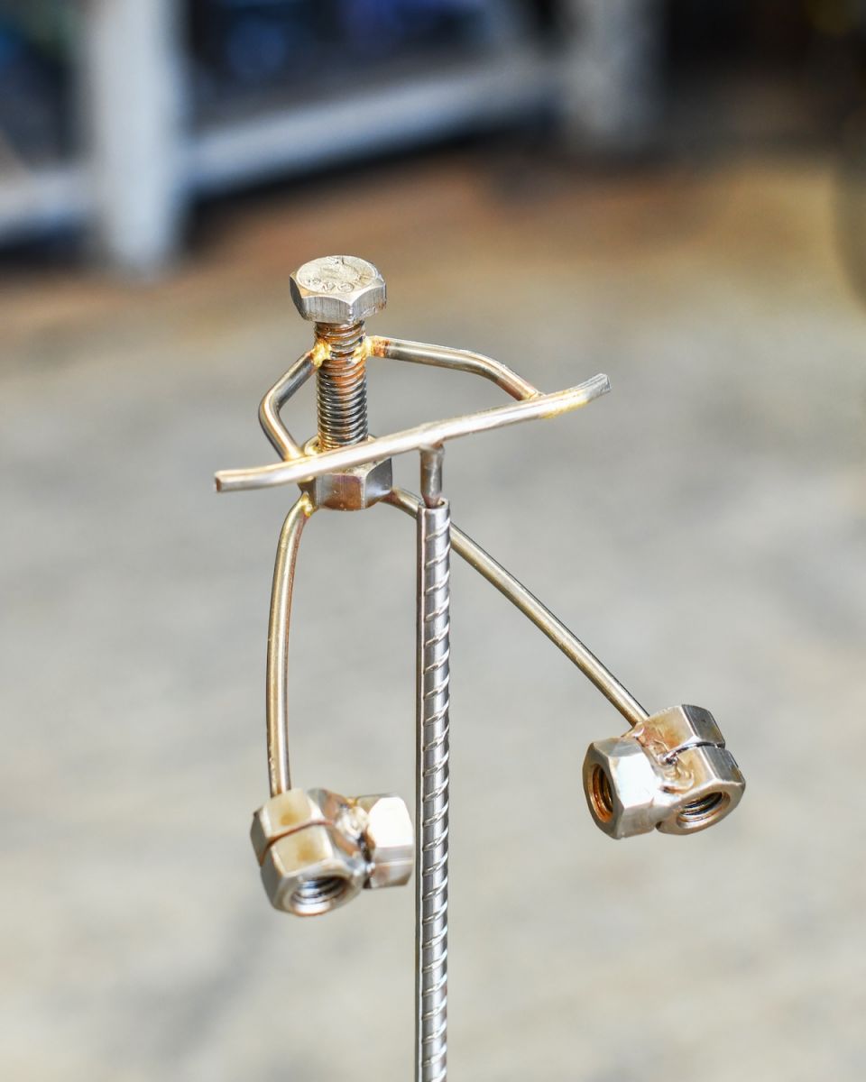 Close up of figure on scrap metal art sculpture