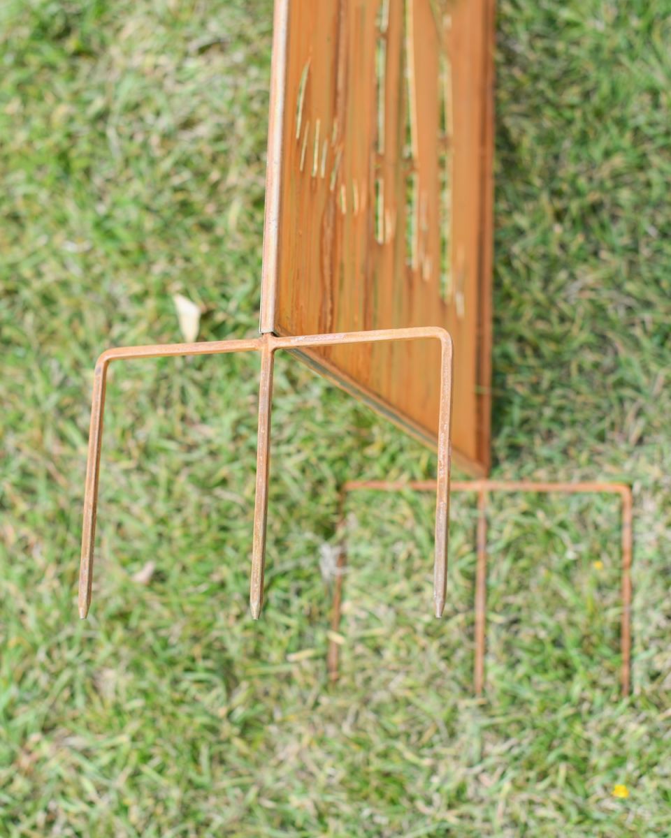 Close up of ground spikes on Rustic Bamboo Decorative Garden Screen