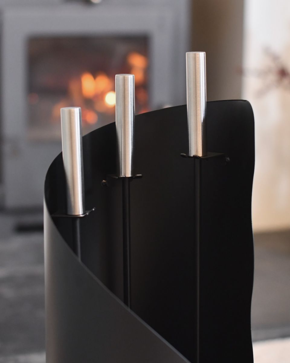 Close up of stainless steel handles on fireside companion set