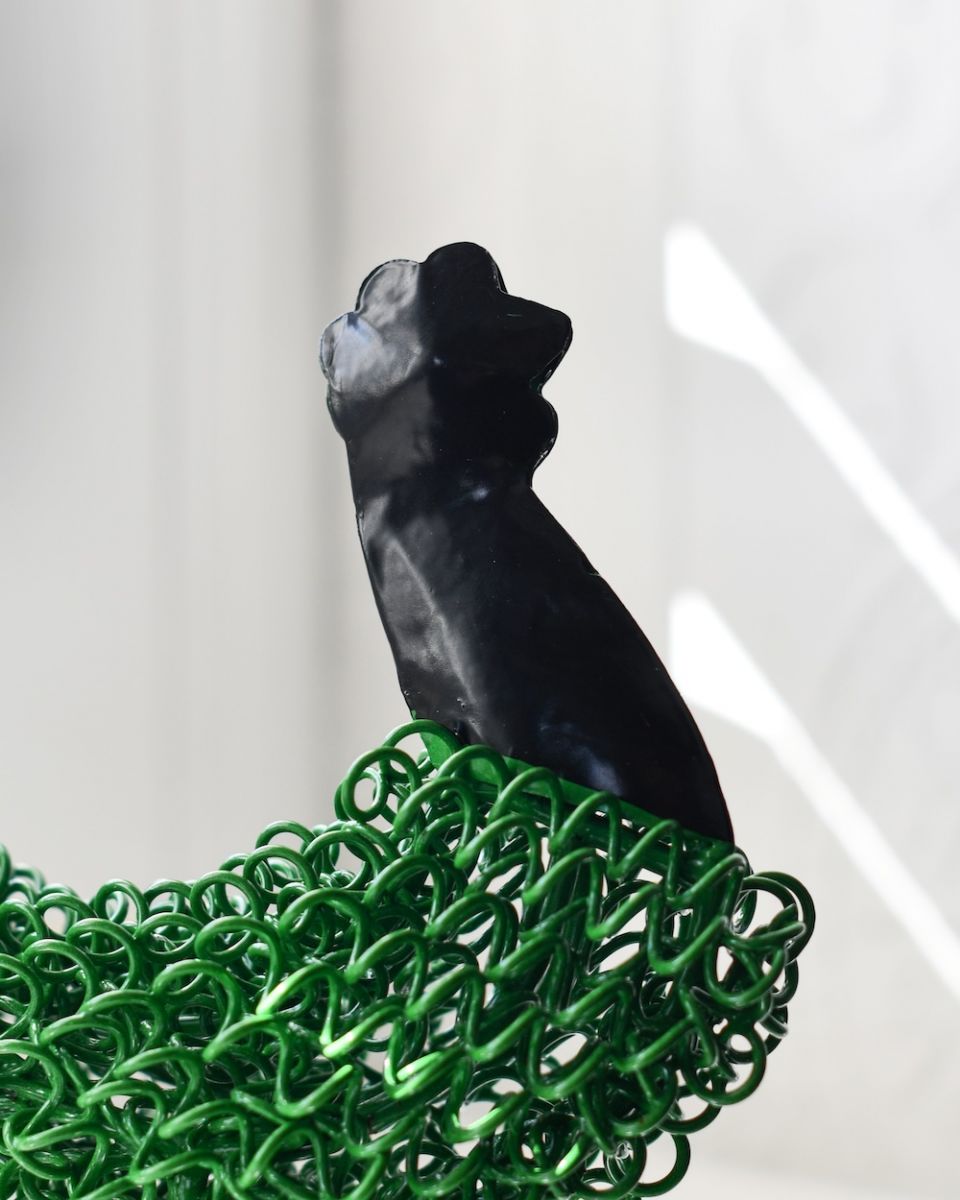 Close up of head detail on recycled cockerel sculpture