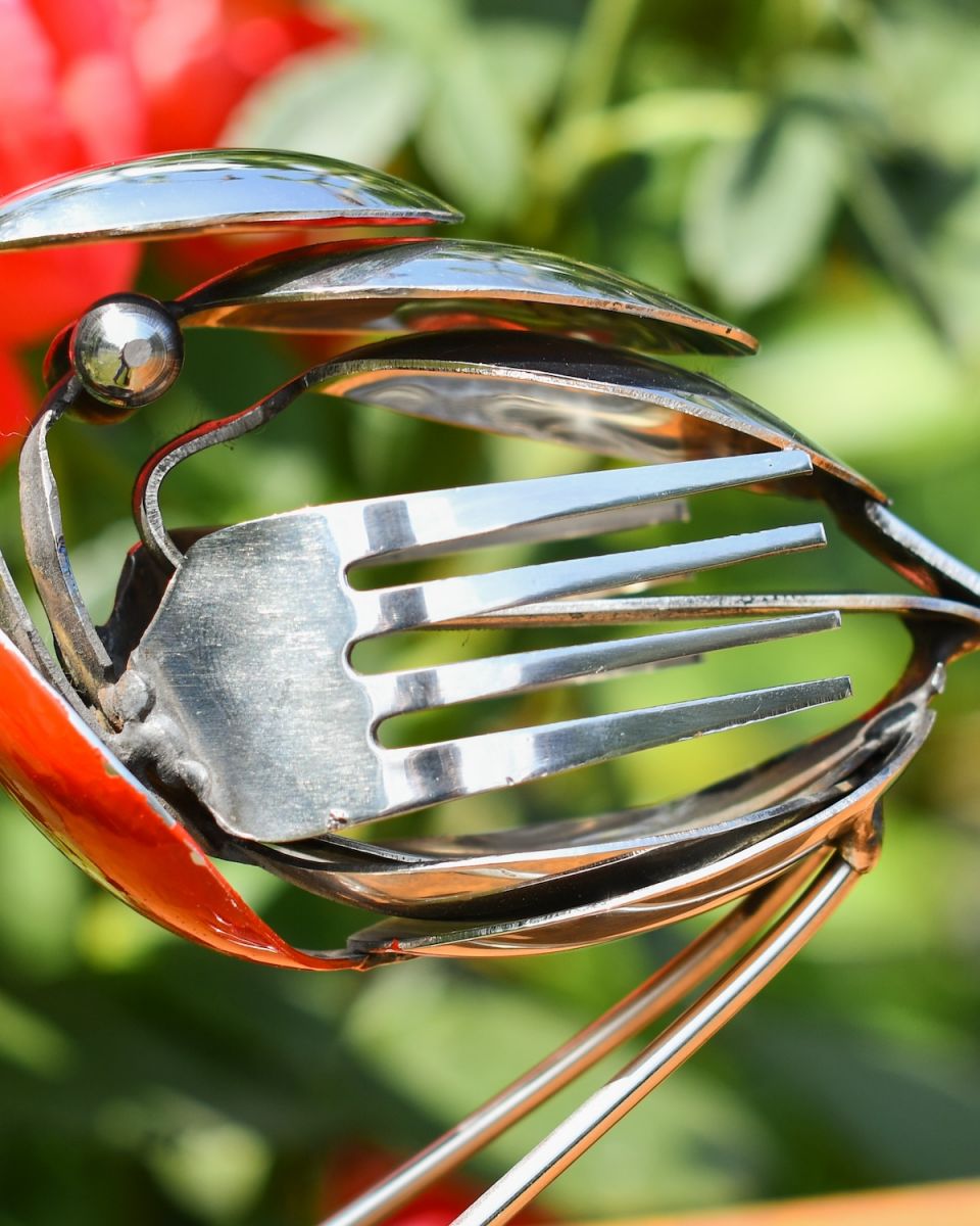 Close up of intricate detail on recycled robin ornament