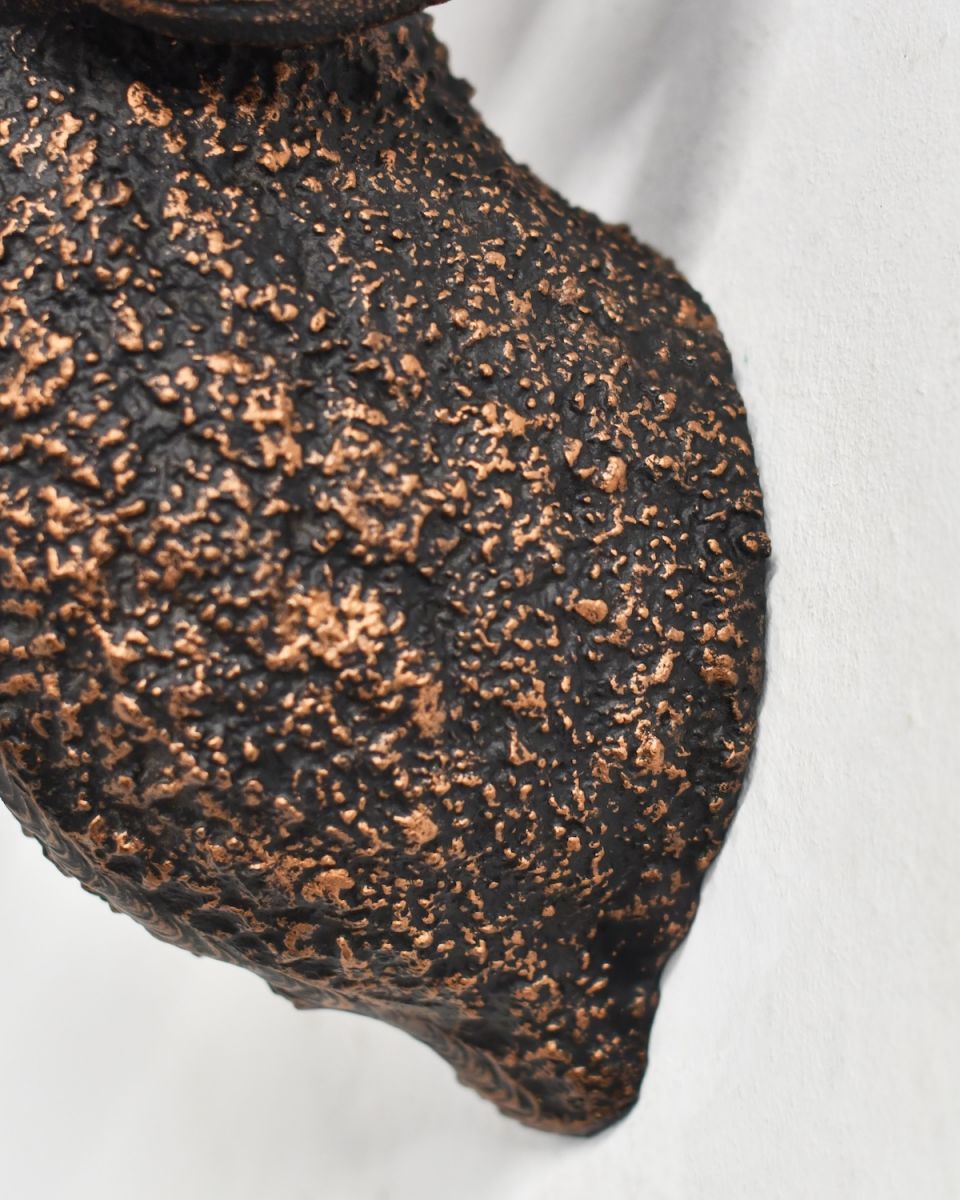 Close up of intricate detail on Copper Ram Wall Bust