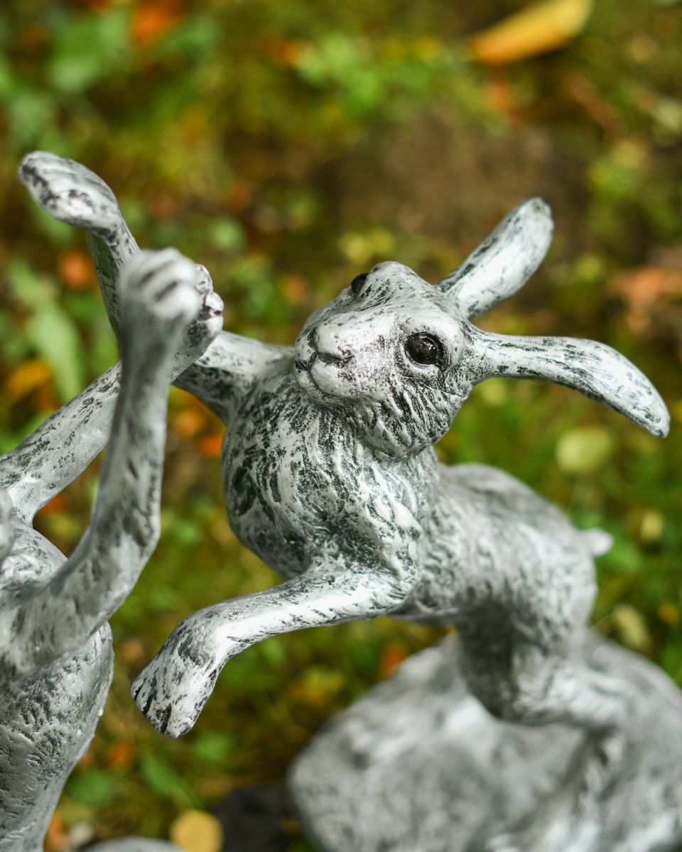 Close up of intricate face detail on hare garden statue