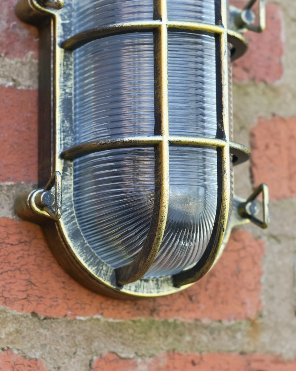 Close up of cage detail on garden wall light