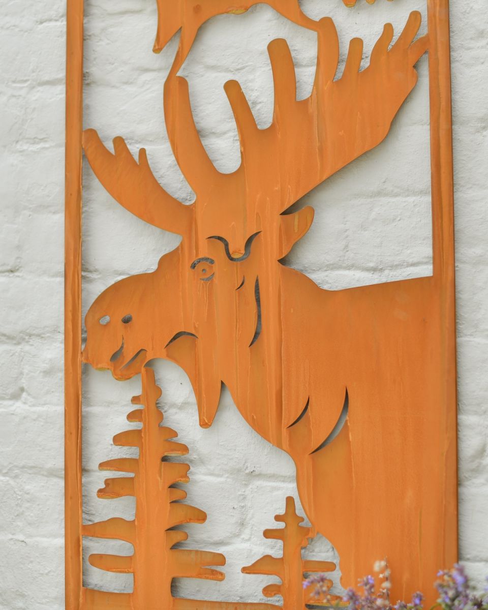 Close up of intricate moose detail on rustic garden art