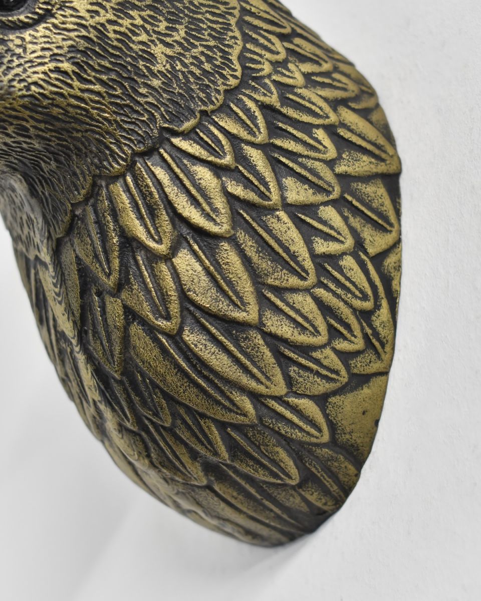 Close up of intricate feather detail on eagle wall bust