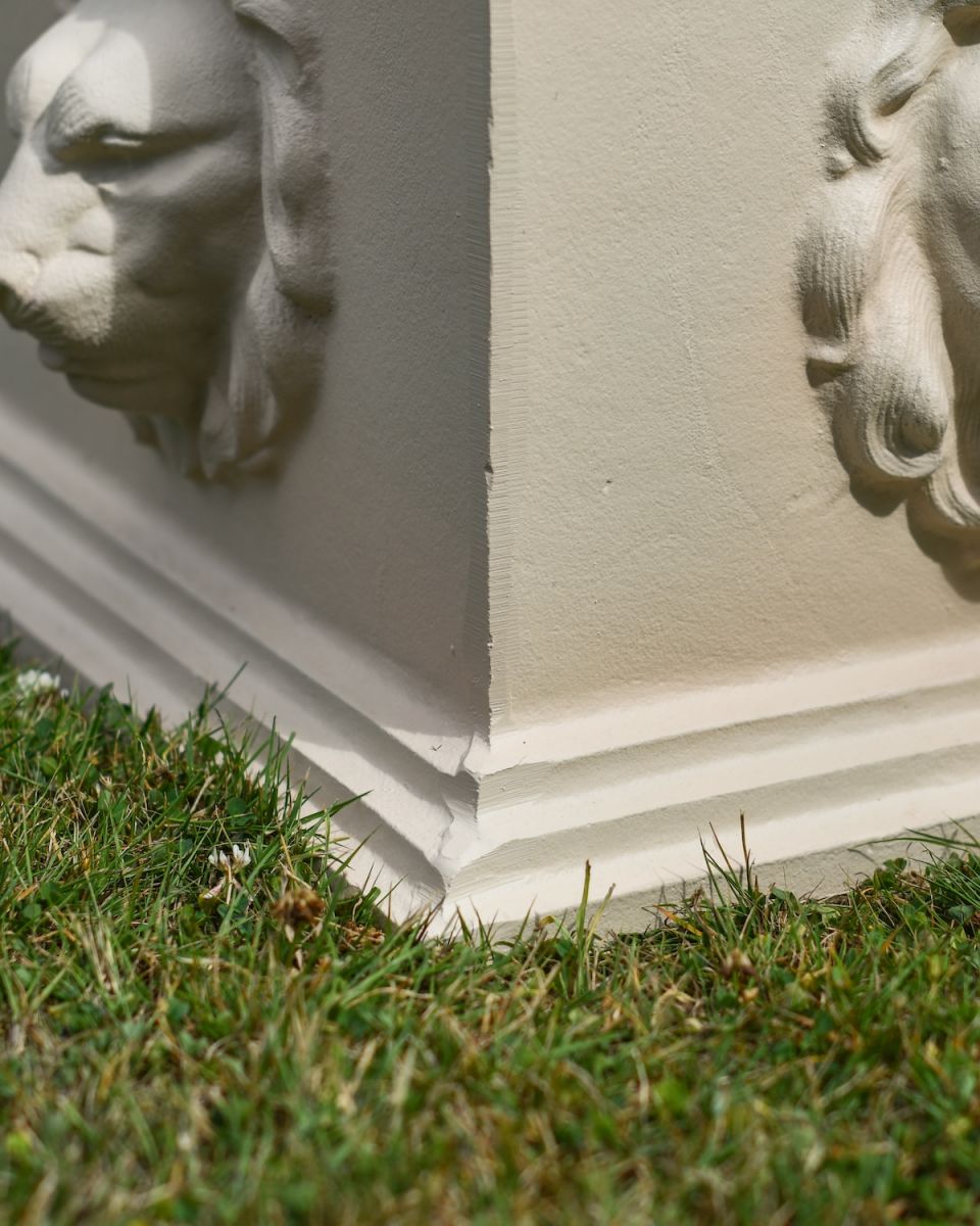 Close up of intricate base detail on garden plinth