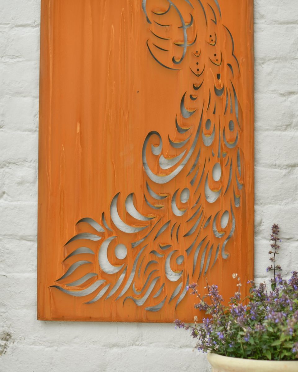 Close up of rustic tail detail on garden wall art Close up of rustic tail detail on garden wall art