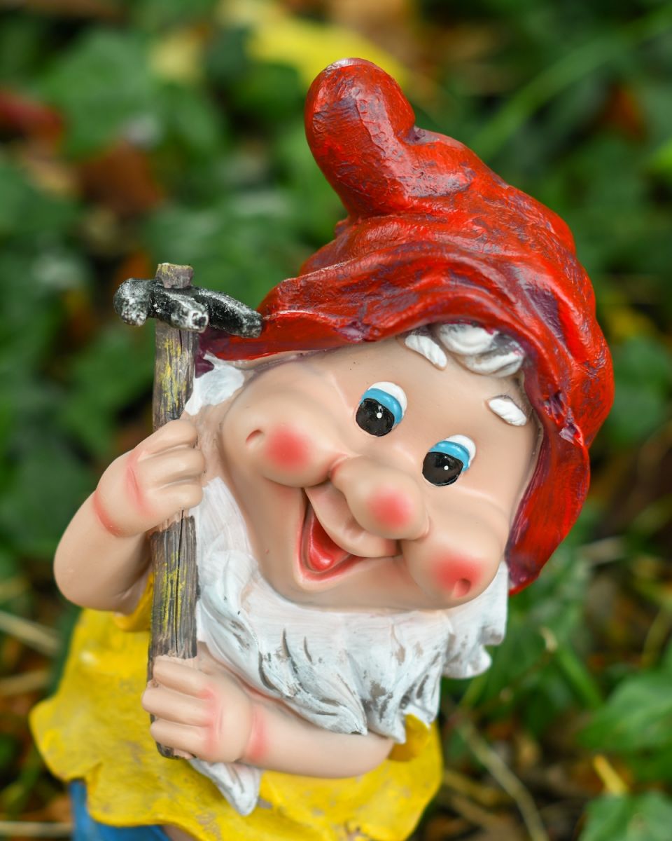 Close up of intricate detailing on garden gnome ornament