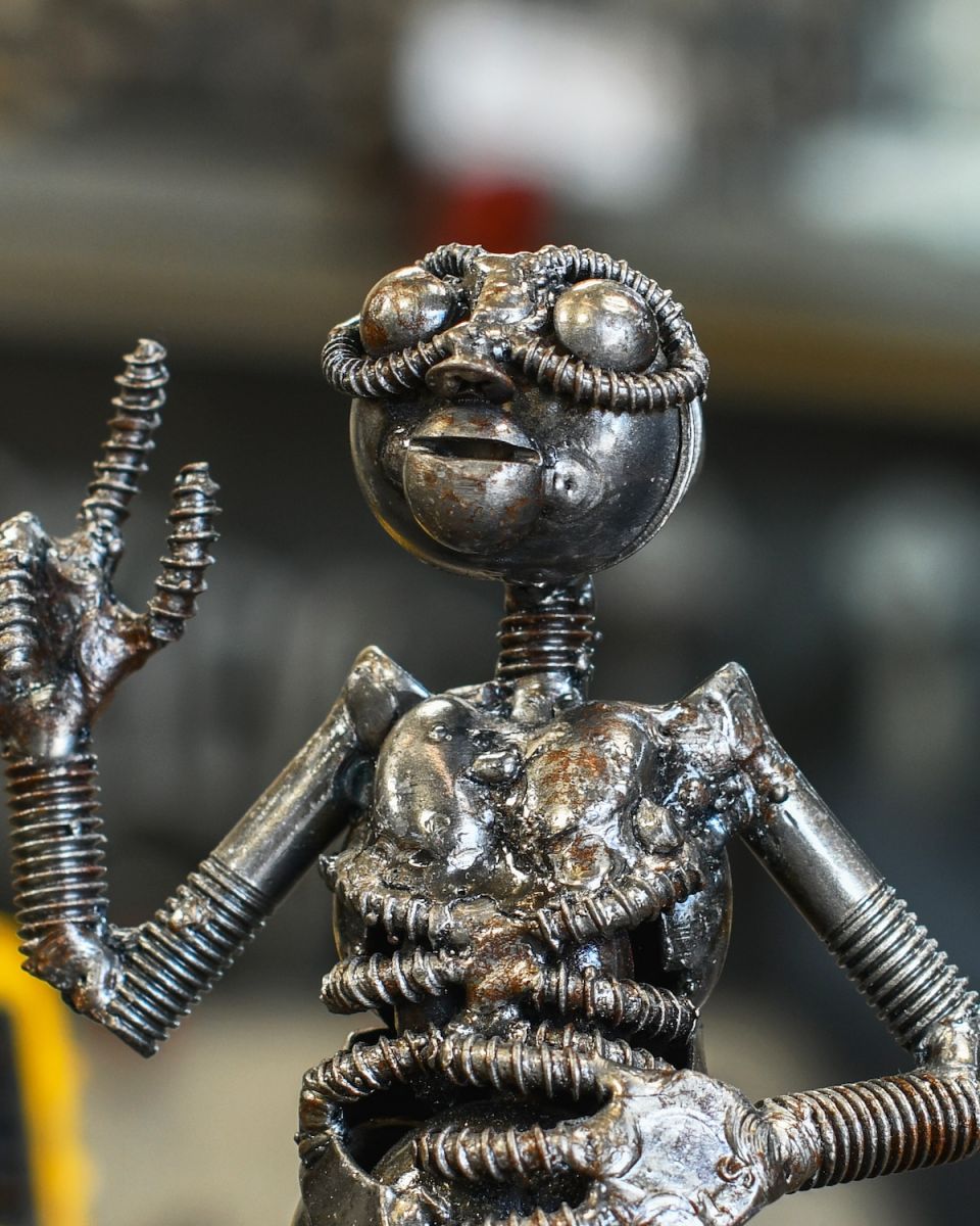 Close up of intricate detail on scrap metal art sculpture Close up of intricate detail on scrap metal art sculpture