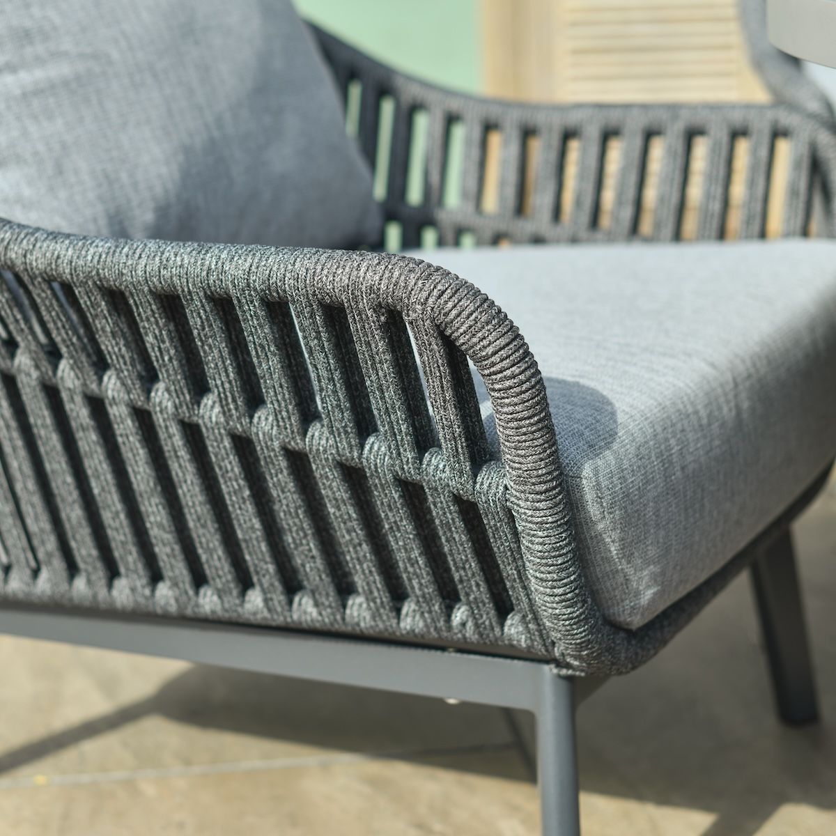 Close up of rope weave detail on armchair on four seater furniture set