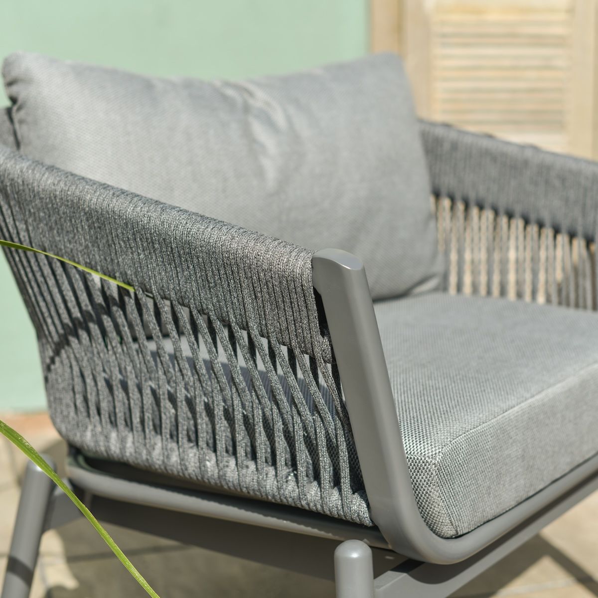 Close up of contemporary rope weave detail on five seater garden furniture set