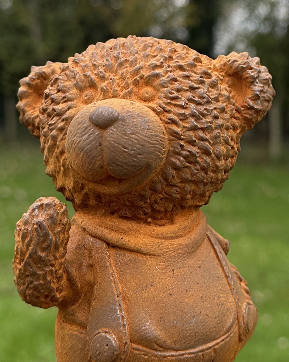 Close up of intricate detail on cast iron bear garden sculpture