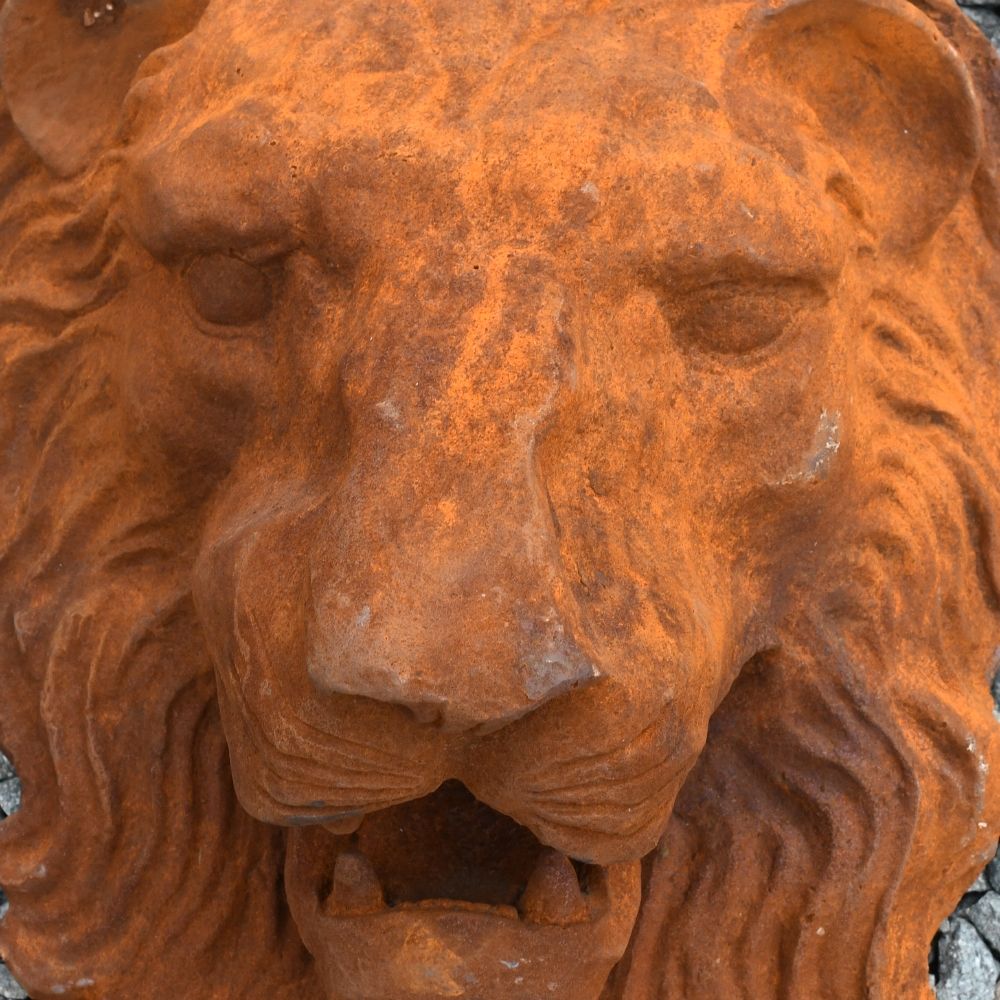 Close-up of Rustic Lion Head Garden Ornament Close-up of Rustic Lion Head Garden Ornament