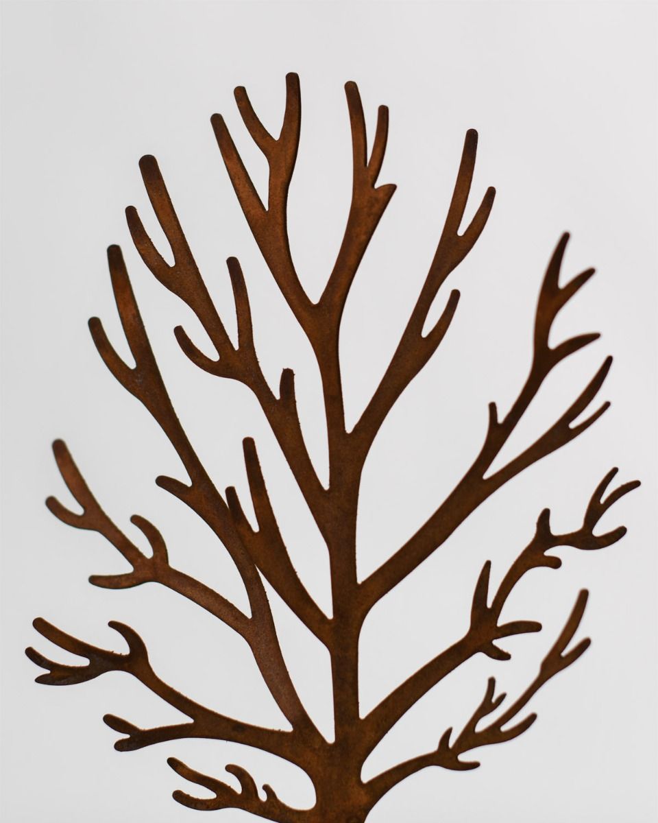 Close up Of Small Rustic Tree Ornament 