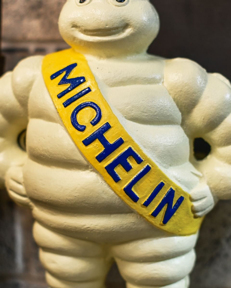 Close up of Michelin man statue sash