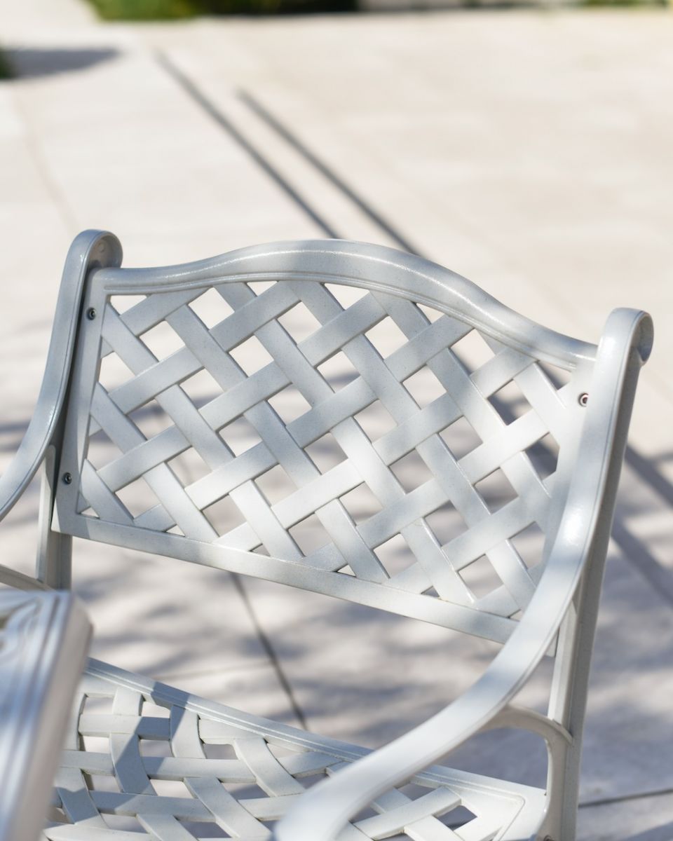close up detail of chair lattice on blanche garden set
