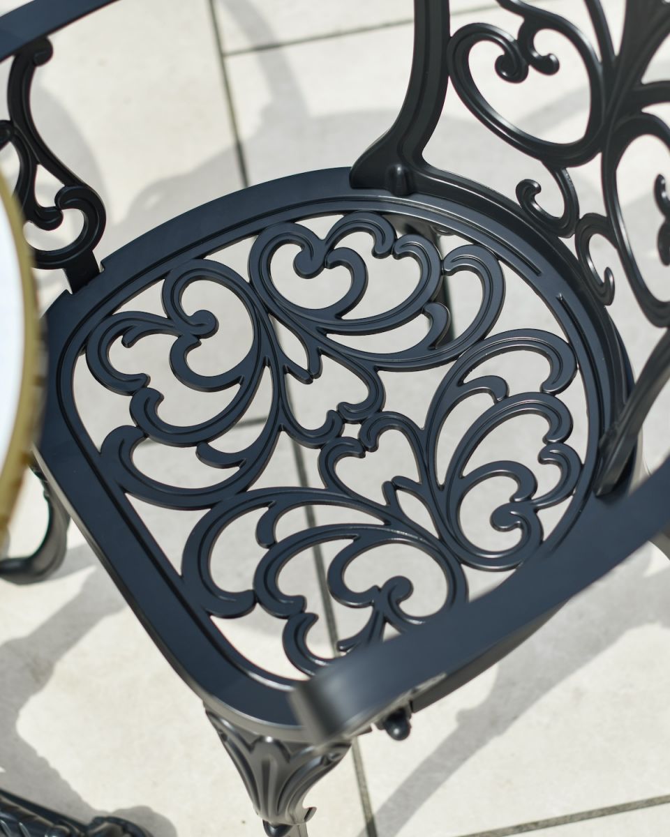 Close up of intricate seat detailing on patio two seater dining set