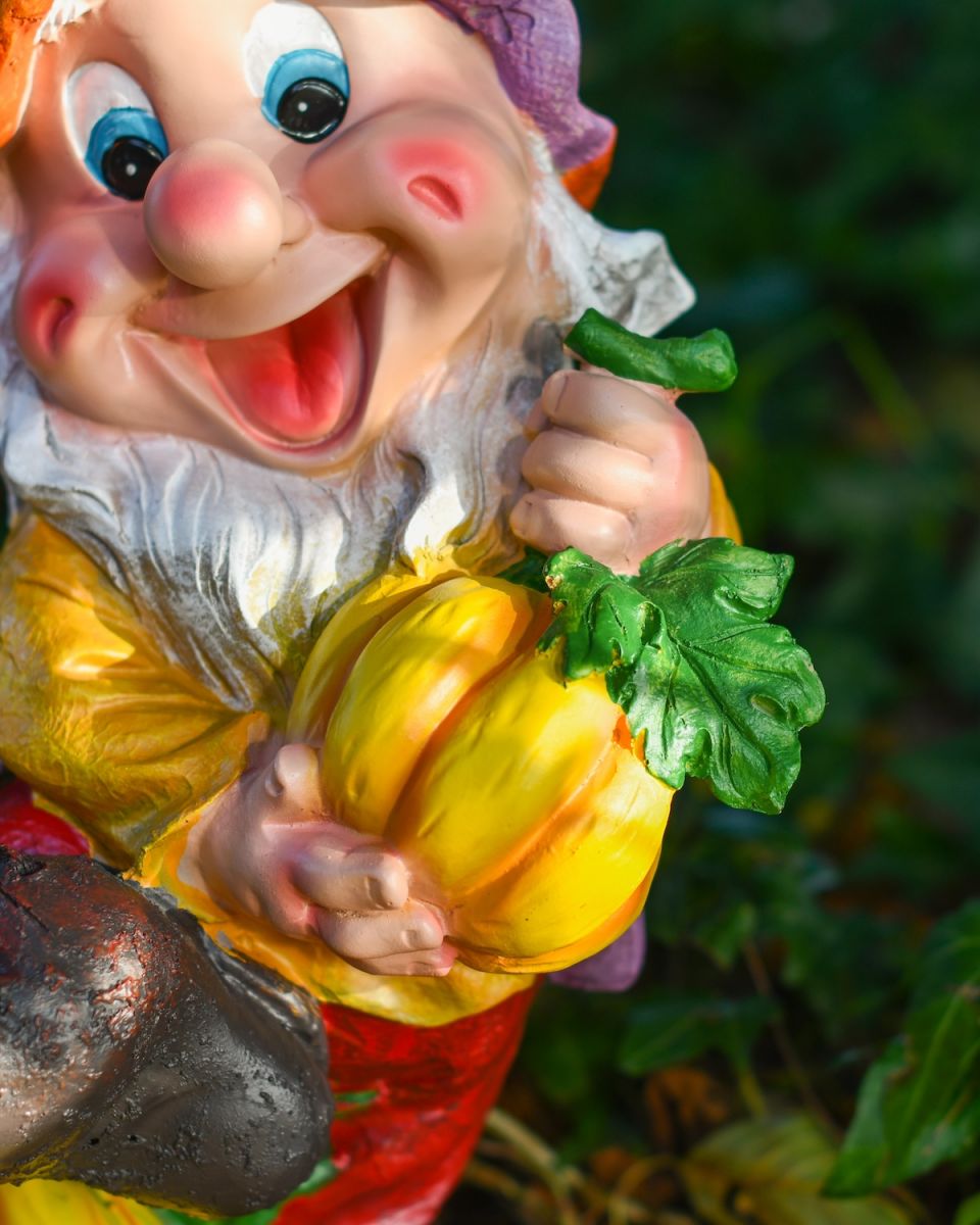 Close up of squash detail on colourful outdoor gnome sculpture