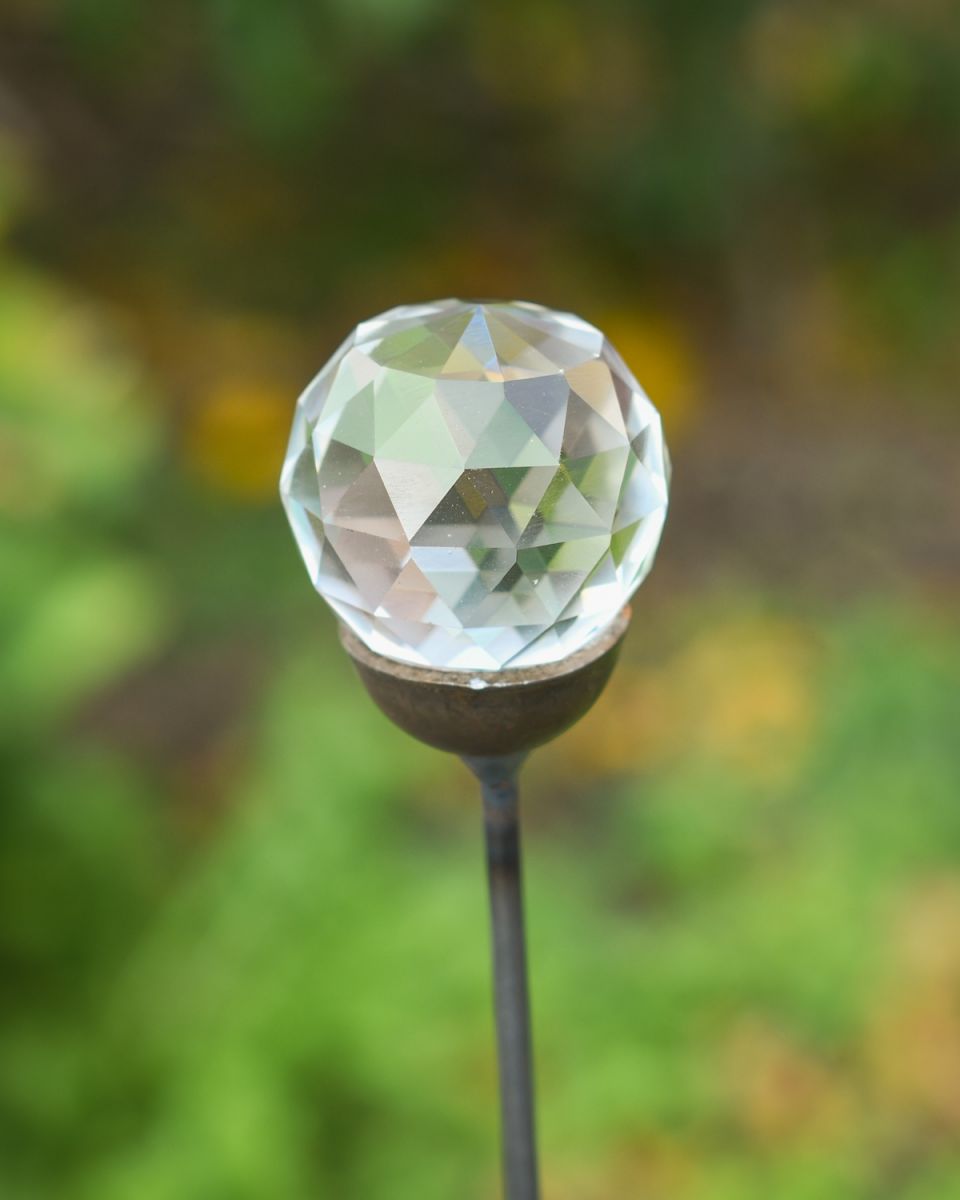 close up of crystal suncatcher detail on garden stake