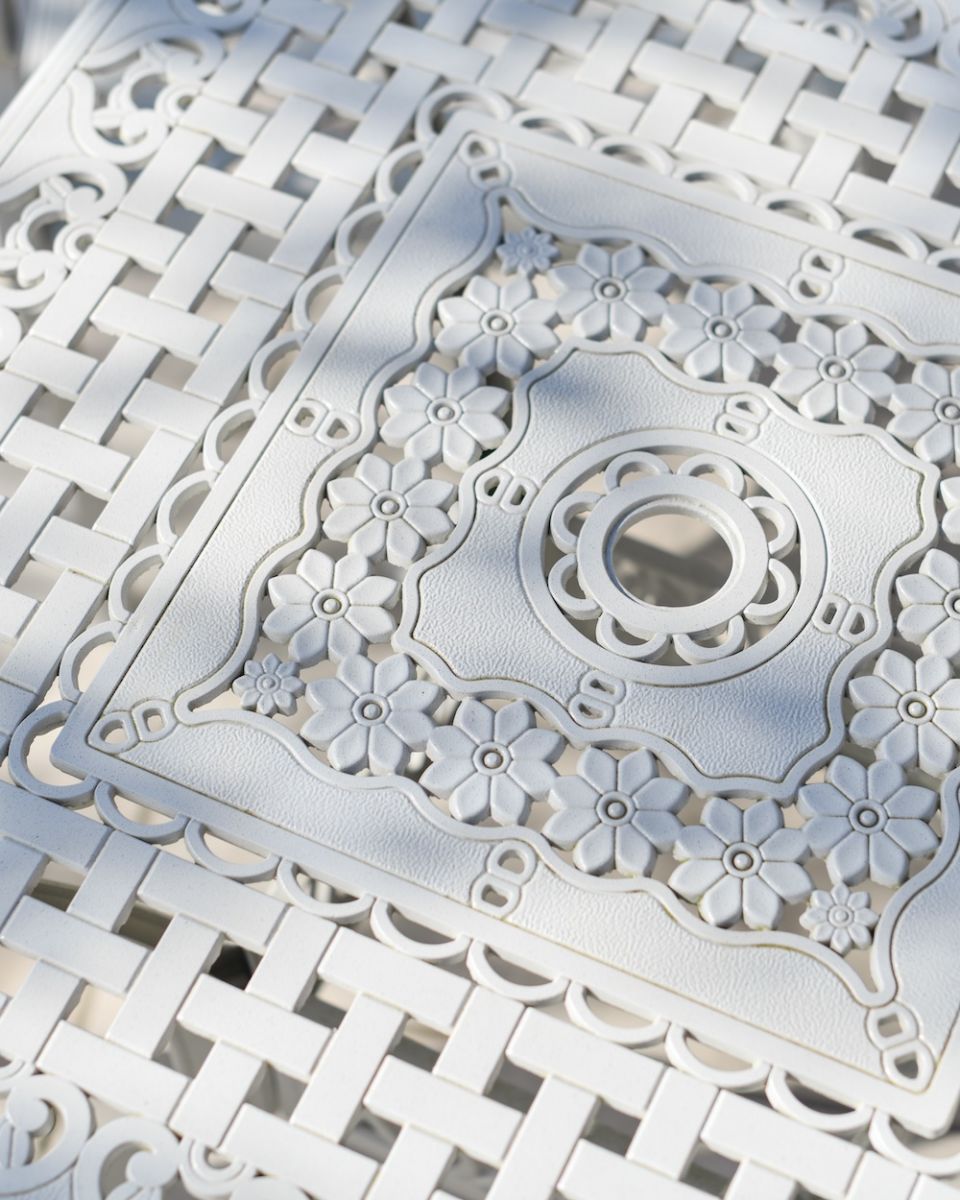 Close up image of table top detailing on blanche garden set