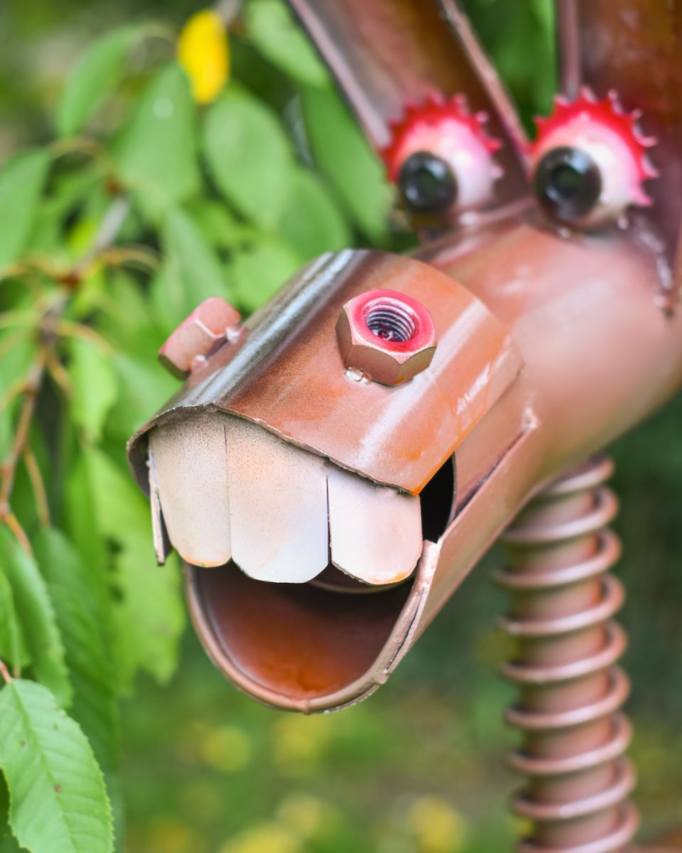 Close up of teeth detail on recycled metal donkey sculpture