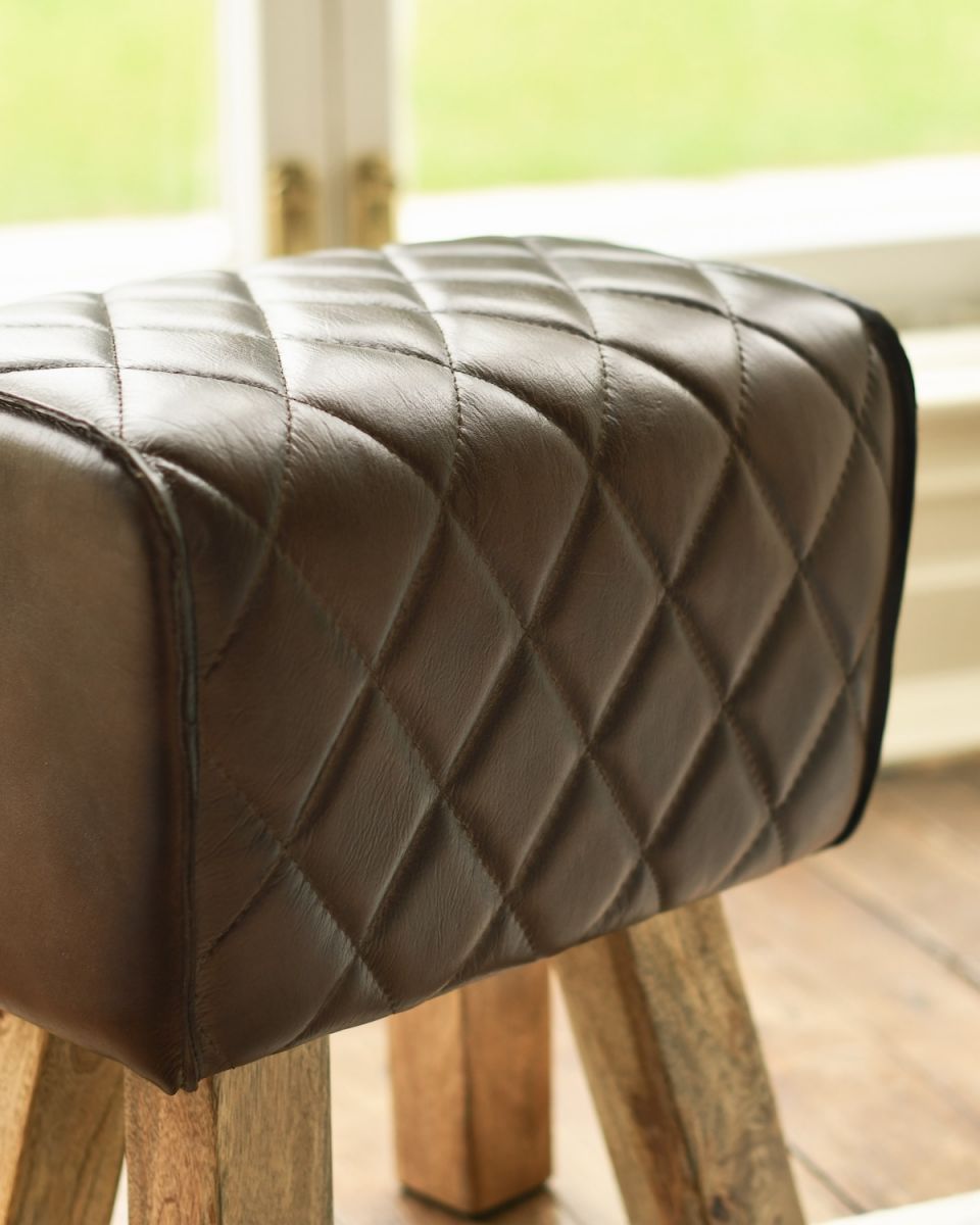 Close up of diamond stitching detail on brown genuine leather foot stool