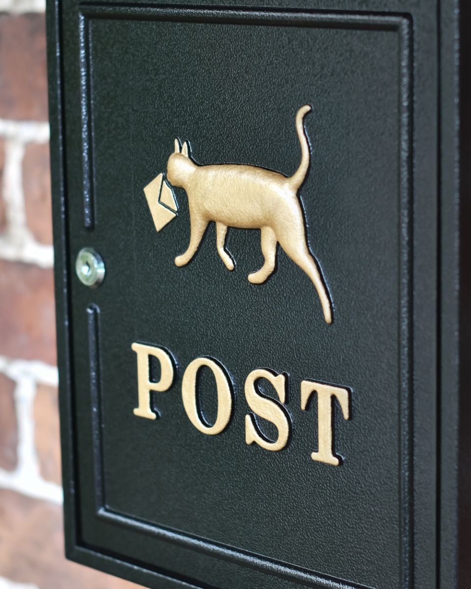 Close Up Of The Cat Motif On The Black Oxford Tabby Times Post Box
