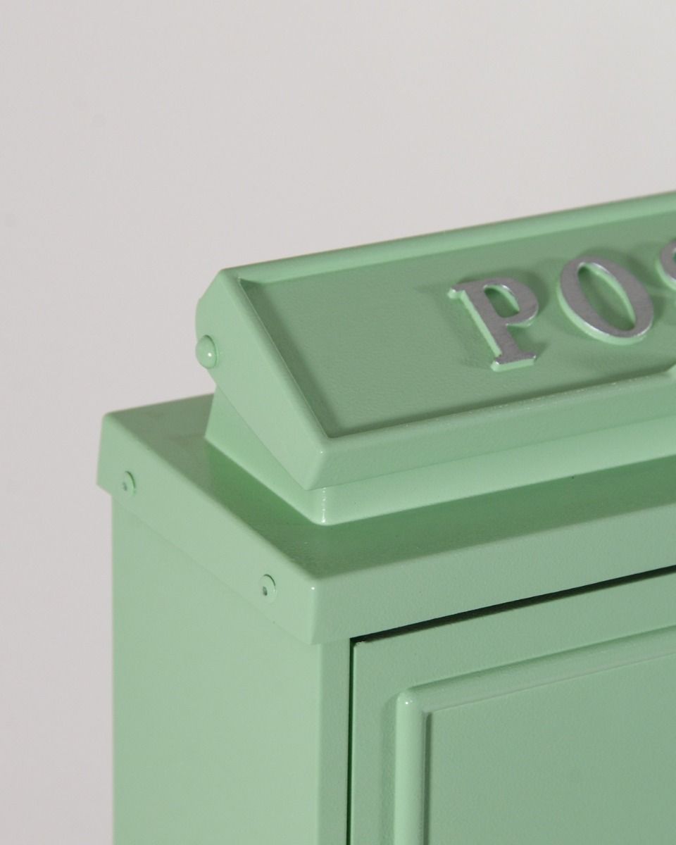 Close up of the Corner and Hinge for the Mint Green "Oxford" Wall Mounted Post Box with Silver Detail