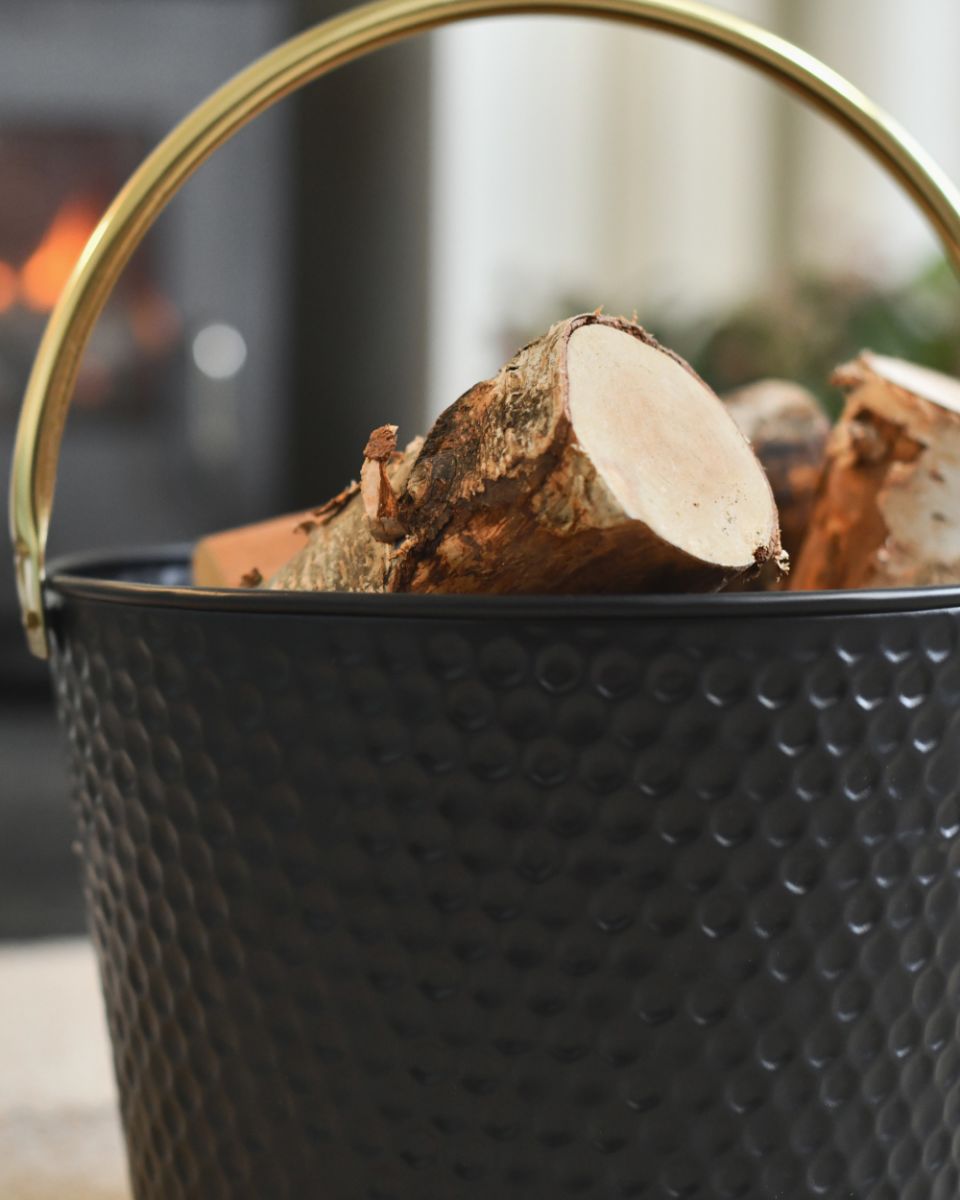 Close Up Of The Dimpled Steel Log Basket Details