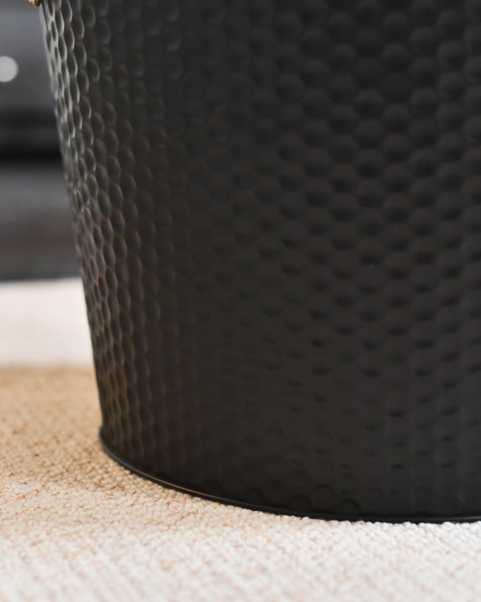 Details On The Black Dimpled Steel Log Basket