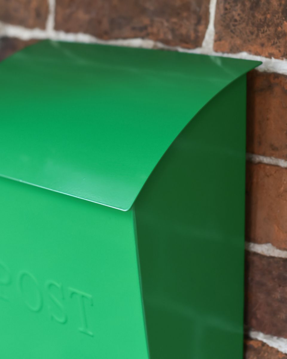 Close Up Of Te Modern Green Wall Mounted Post Box