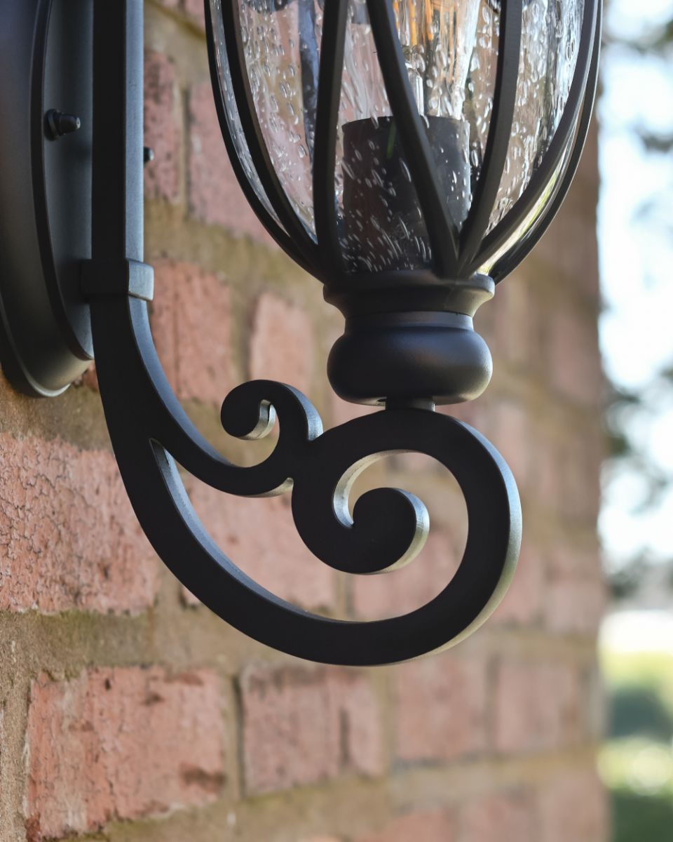 Close Up Of The ornate Bracket On The Cropley Wall Light Close Up Of The ornate Bracket On The Cropley Wall Light