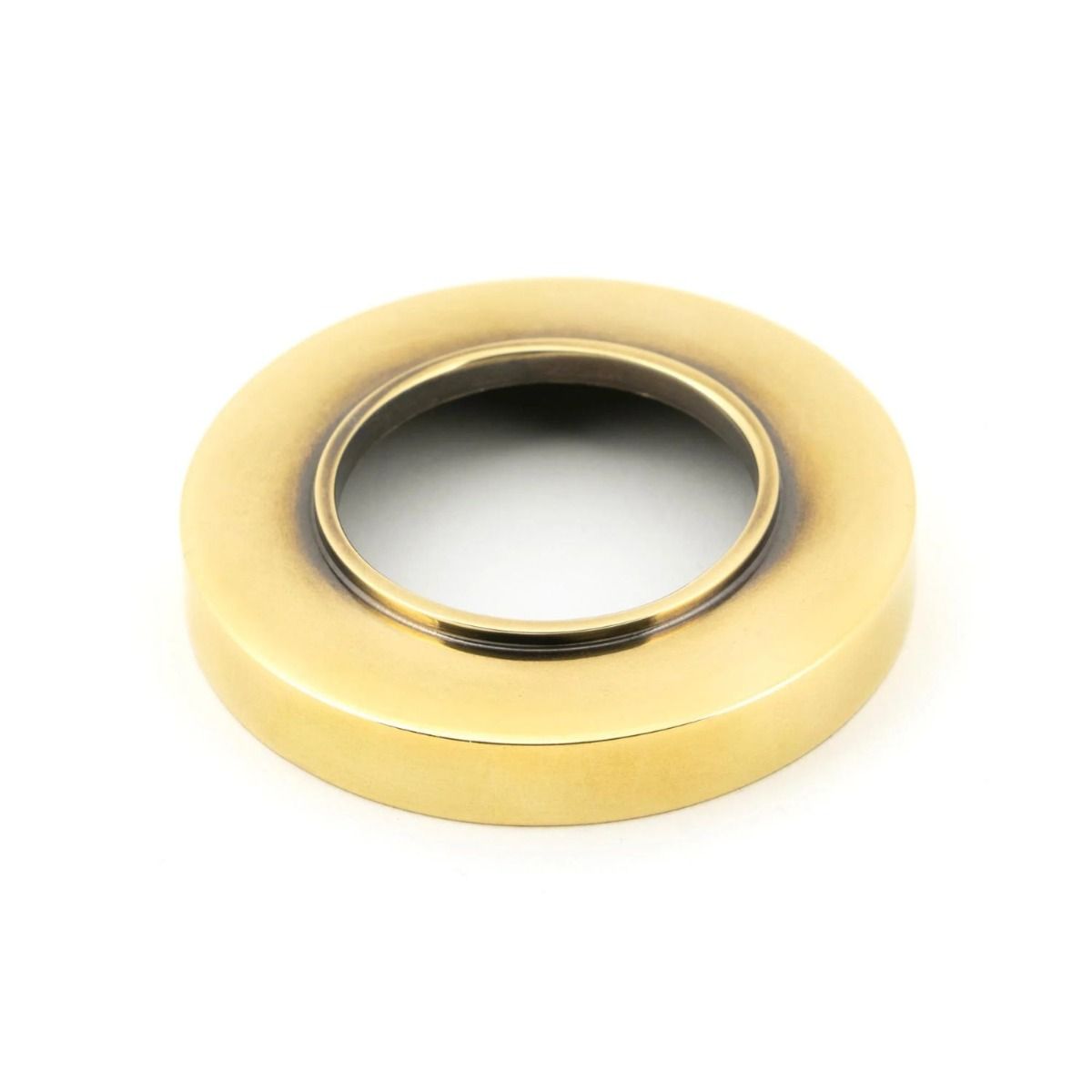 The Plain Rose Set in Aged Brass on a White Background a White Background 