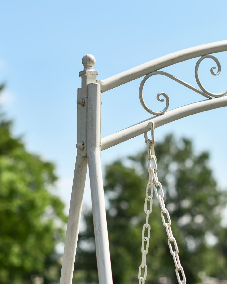 Close up of intricate detail on Cream French Scrolled Swing Seat