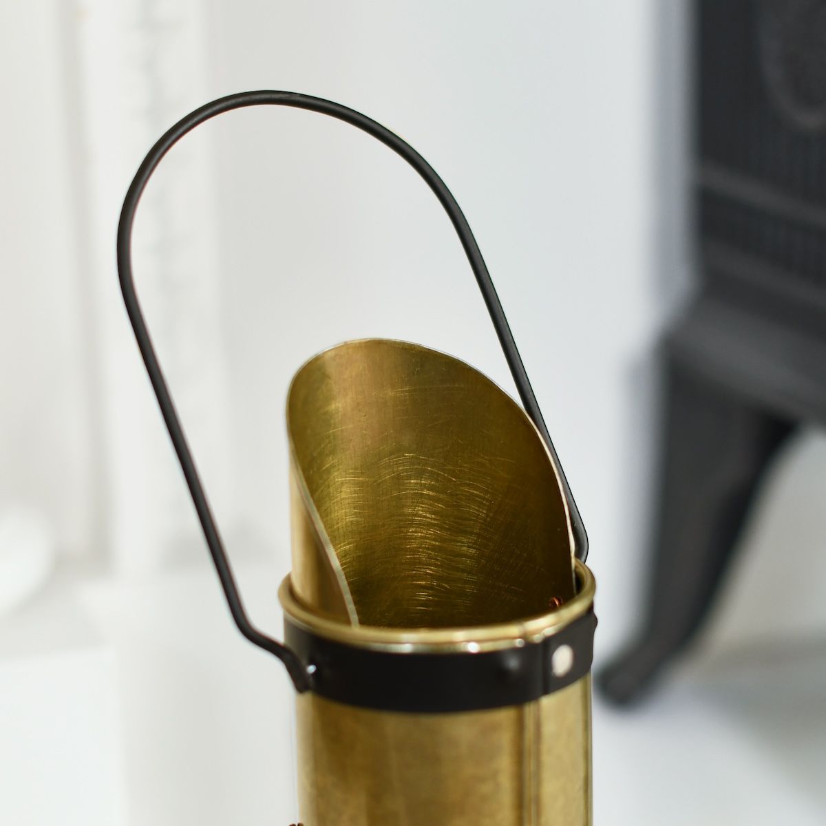 Close up of top of bronze match holder