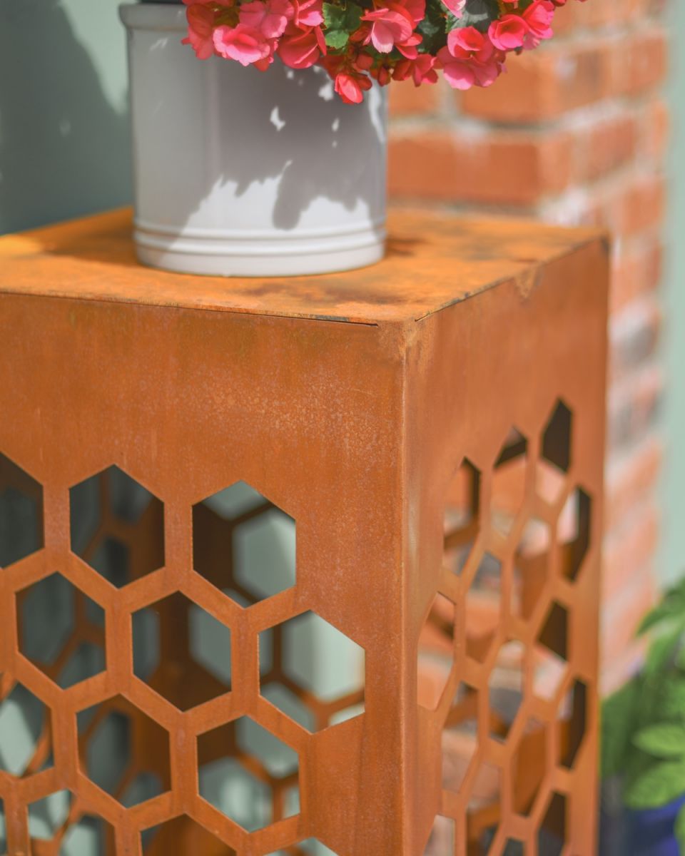 Close up of intricate detail on rustic garden column