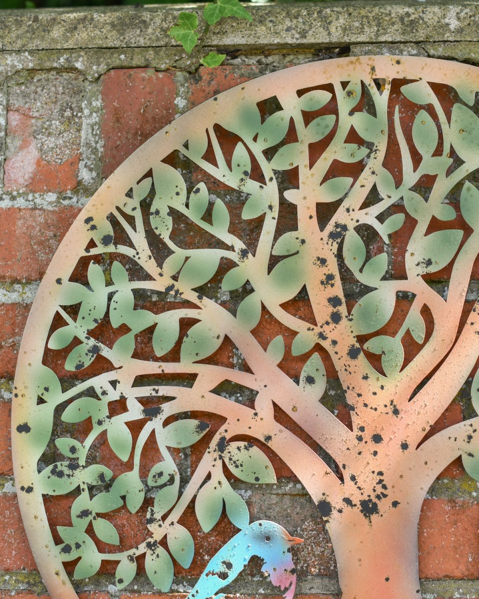 Close up of rustic natural tree detailing on garden wall art