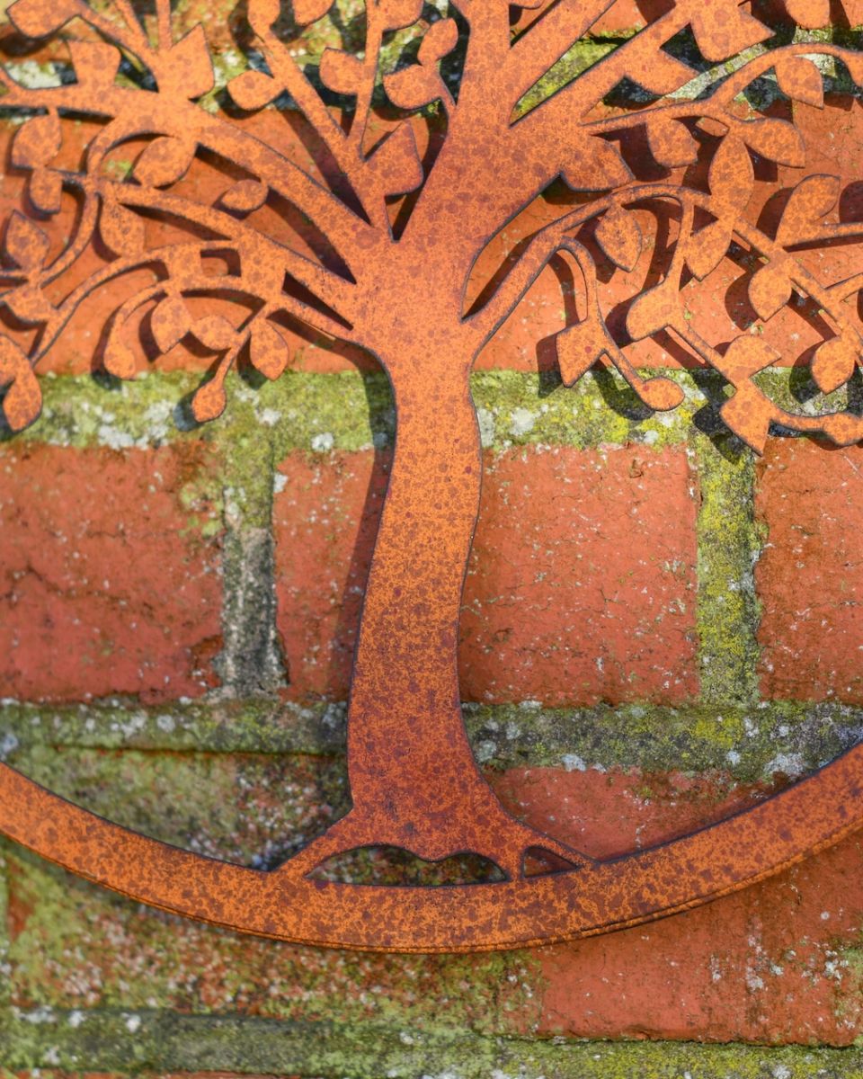 Close up of trunk detail on rustic garden wall art